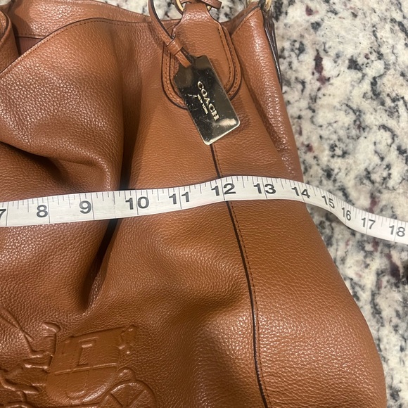 Authentic Coach Edie large brown leather purse.
